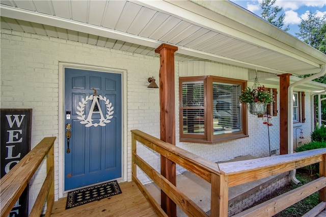 property entrance with a porch