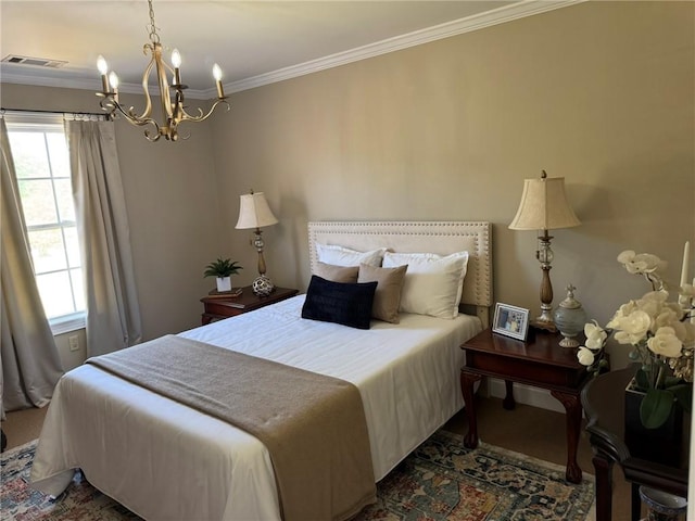 6207 County Road 222, Five Points, AL 36855 - bedroom with a chandelier and crown molding