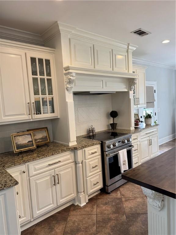 6207 County Road 222, Five Points, AL 36855 - kitchen featuring electric stove, backsplash, white cabinetry, ornamental molding, and recessed lighting