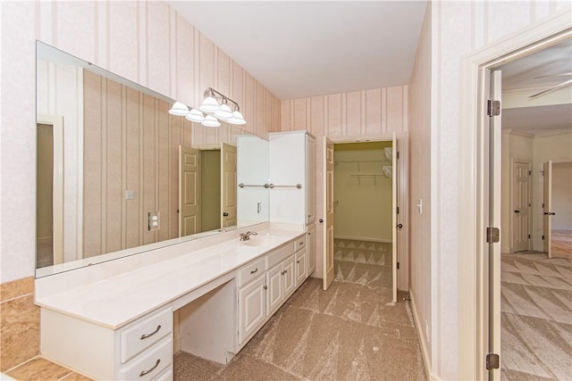 bathroom with vanity and ceiling fan