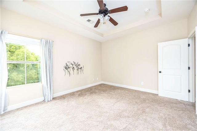 167 Vinci Way, Auburn, AL 36830 - empty room with a tray ceiling, carpet floors, and ceiling fan