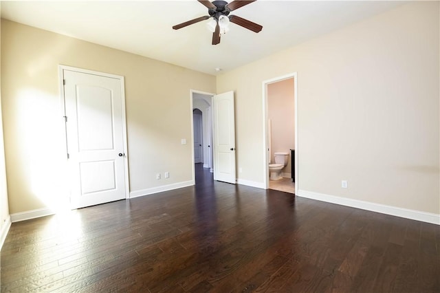full bathroom with toilet, vanity, bathtub / shower combination, and baseboards
