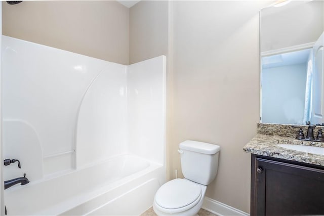 carpeted spare room with plenty of natural light, ceiling fan, a raised ceiling, and baseboards