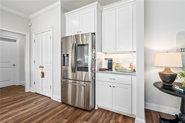 kitchen with dark wood finished floors, backsplash, and stainless steel fridge with ice dispenser