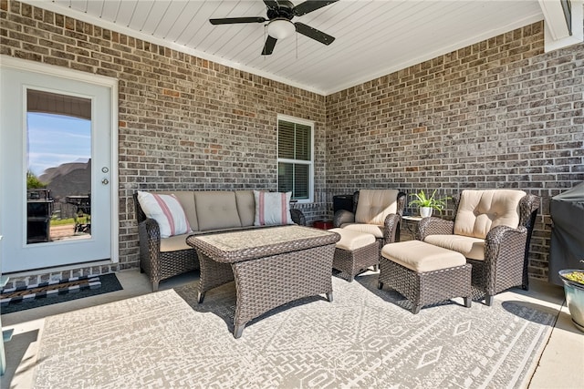 view of patio featuring outdoor lounge area and a ceiling fan