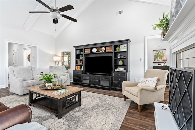 living area with visible vents, high vaulted ceiling, dark wood-type flooring, and a ceiling fan