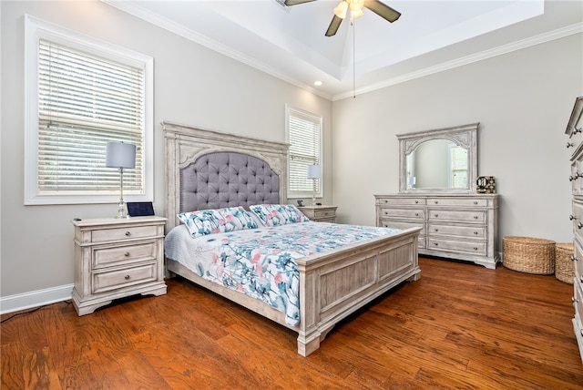 4164 Creekview Ct, Auburn, AL 36832 - bedroom with dark wood-style floors, ornamental molding, a ceiling fan, and a tray ceiling
