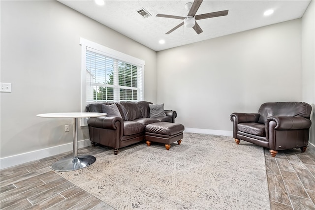 303 N Ross St Unit 104, Auburn, AL 36830 - living room with a ceiling fan, baseboards, wood finished floors, and recessed lighting