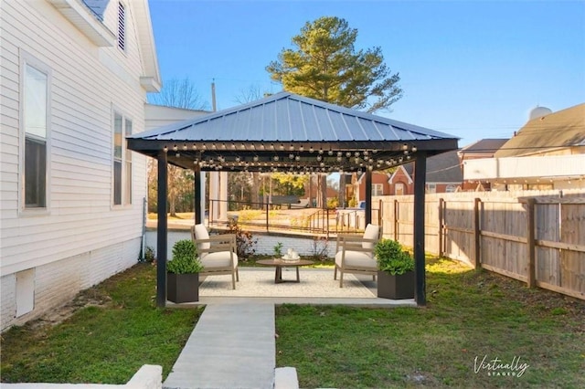 view of yard featuring a gazebo and a patio