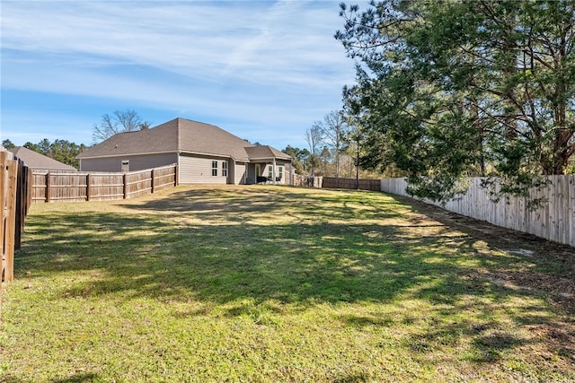 view of yard featuring a fenced backyard