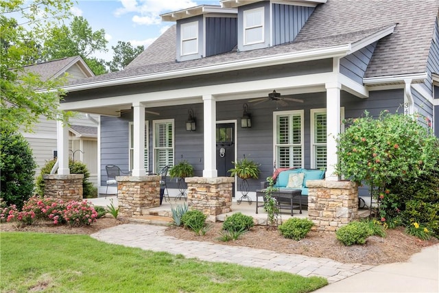 3412 Double Eagle Ln, Opelika, AL 36801 - view of front of home with a porch, ceiling fan, stone siding, and roof with shingles