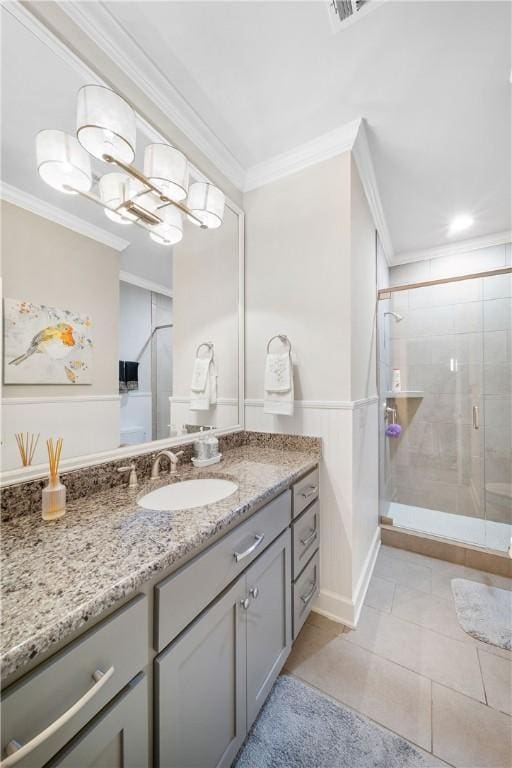 3412 Double Eagle Ln, Opelika, AL 36801 - full bathroom with crown molding, vanity, a stall shower, and tile patterned flooring