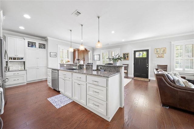 3412 Double Eagle Ln, Opelika, AL 36801 - kitchen featuring a sink, stainless steel dishwasher, crown molding, plenty of natural light, and dark wood-style floors