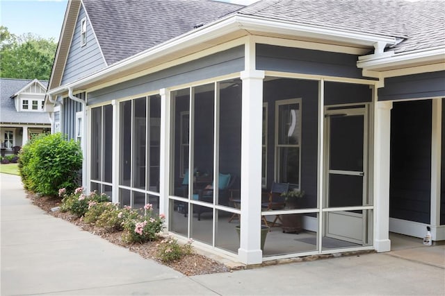 3412 Double Eagle Ln, Opelika, AL 36801 - view of home's exterior featuring roof with shingles and a sunroom