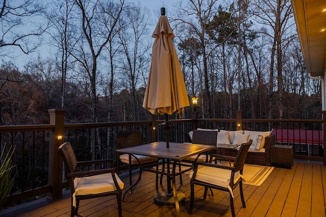 255 Hedgerow Cir, Auburn, AL 36830 - wooden terrace with outdoor dining space and outdoor lounge area