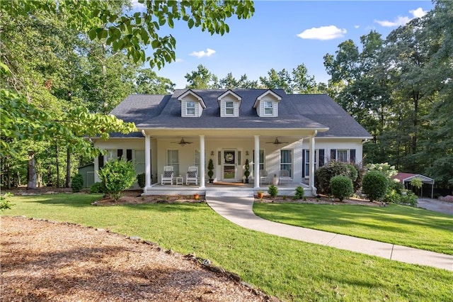 255 Hedgerow Cir, Auburn, AL 36830 - new england style home with a ceiling fan, covered porch, and a front yard