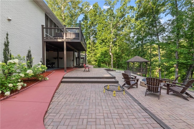 255 Hedgerow Cir, Auburn, AL 36830 - view of patio / terrace with a gazebo, a wooden deck, stairway, and an outdoor fire pit