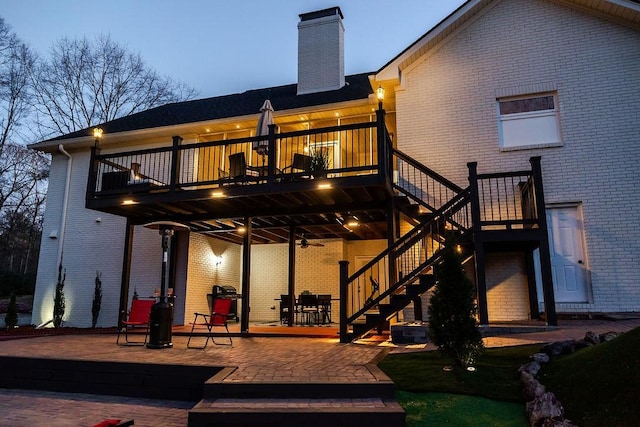 255 Hedgerow Cir, Auburn, AL 36830 - back of house featuring a patio, brick siding, stairway, a ceiling fan, and a chimney
