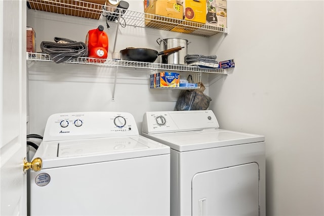 laundry room with independent washer and dryer