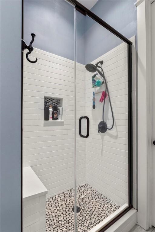 bathroom with an enclosed shower