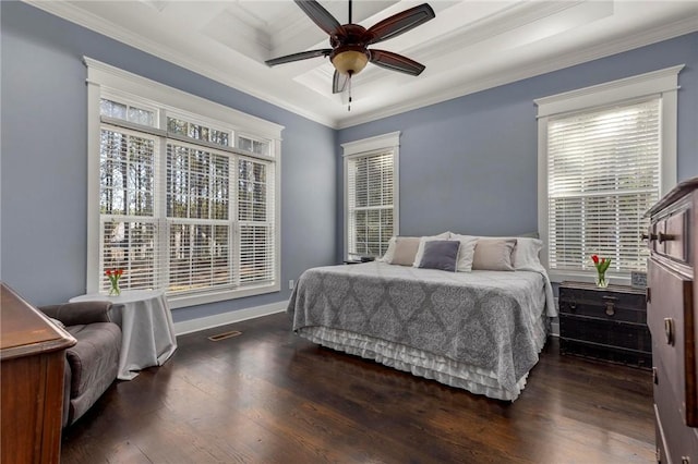 bedroom featuring dark wood-type flooring, ceiling fan, and ornamental molding