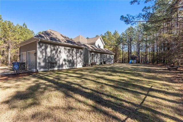 view of home's exterior featuring a lawn