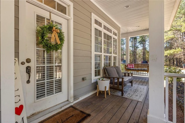 wooden deck featuring a porch