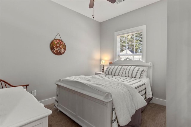 carpeted bedroom featuring ceiling fan