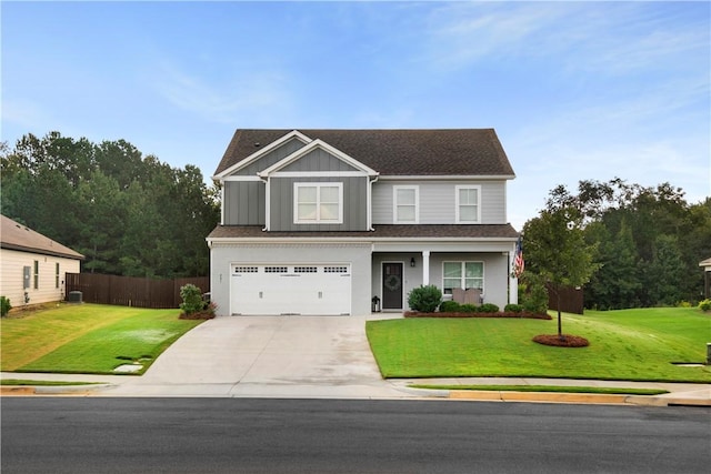 view of front facade featuring a front yard and a garage