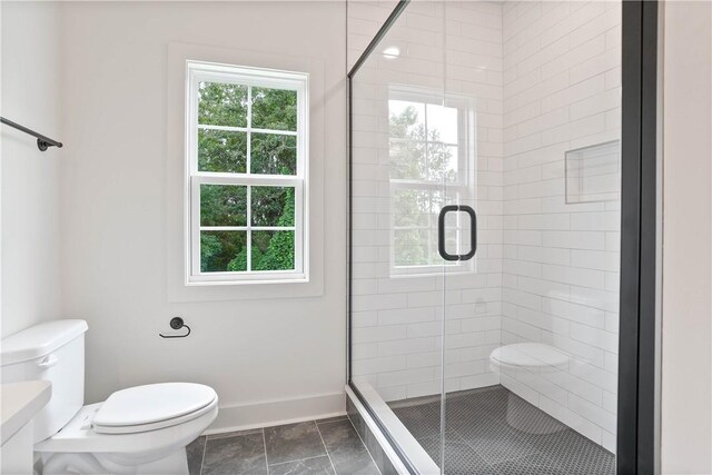 03242 Bradley Ln, Auburn, AL 36830 - bathroom with toilet and a shower stall