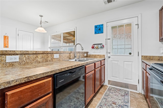 kitchen featuring sink, hanging light fixtures, decorative backsplash, black dishwasher, and stainless steel range