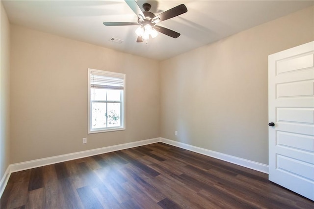 unfurnished room featuring dark hardwood / wood-style floors and ceiling fan