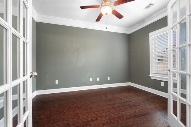 spare room with crown molding, ceiling fan, dark hardwood / wood-style flooring, and french doors