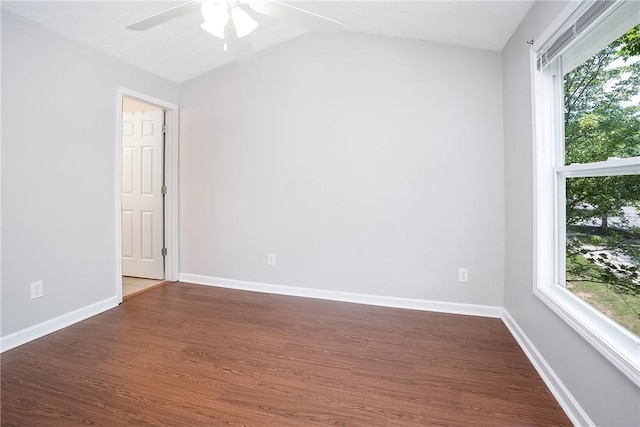 1385 S Donahue Dr Unit 4201, Auburn, AL 36832 - spare room with plenty of natural light, dark wood-style flooring, a ceiling fan, and vaulted ceiling