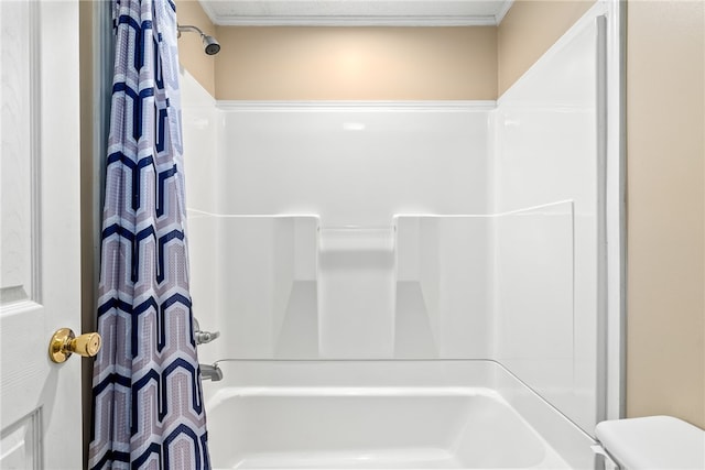 bathroom with shower / bath combo with shower curtain