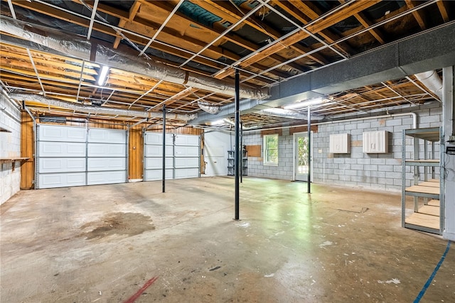 basement featuring concrete block wall