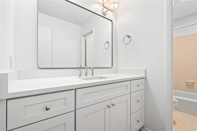 full bath with shower / bath combination, vanity, and toilet