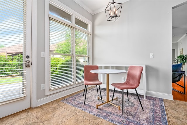 2674 Canal Ct, Auburn, AL 36830 - dining area with a chandelier, ornamental molding, and baseboards