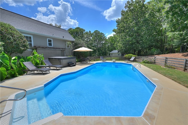 1900 Wrights Mill Rd, Auburn, AL 36830 - view of swimming pool featuring a hot tub, a patio, and view of wooded area