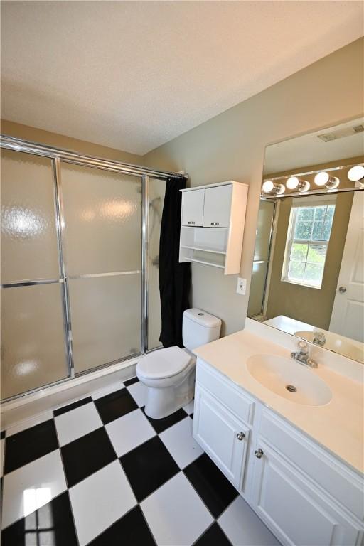 1900 Wrights Mill Rd, Auburn, AL 36830 - full bath with vanity, tile patterned floors, and a shower stall