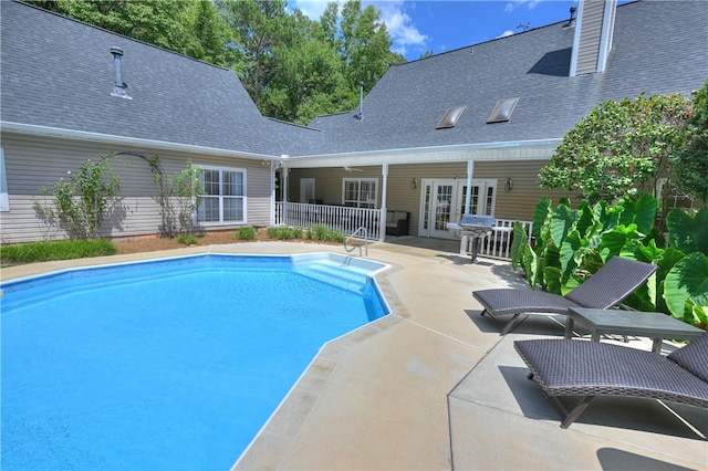 view of pool with a patio area, ceiling fan, french doors, and area for grilling