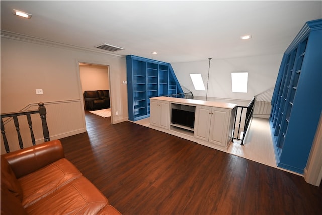 1900 Wrights Mill Rd, Auburn, AL 36830 - kitchen featuring open shelves, dark wood-style floors, built in shelves, blue cabinetry, and a wainscoted wall