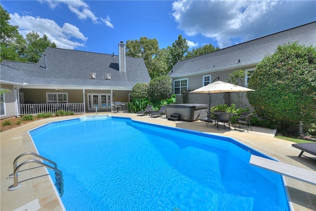 1900 Wrights Mill Rd, Auburn, AL 36830 - swimming pool featuring a hot tub, french doors, a patio, and a diving board