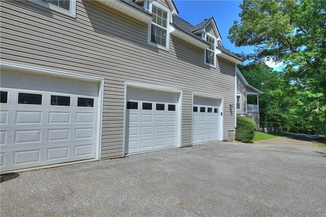 1900 Wrights Mill Rd, Auburn, AL 36830 - view of side of property featuring an attached garage and driveway