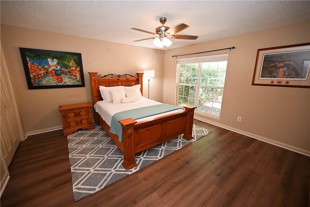 1900 Wrights Mill Rd, Auburn, AL 36830 - bedroom featuring dark wood-style flooring, a ceiling fan, and a textured ceiling