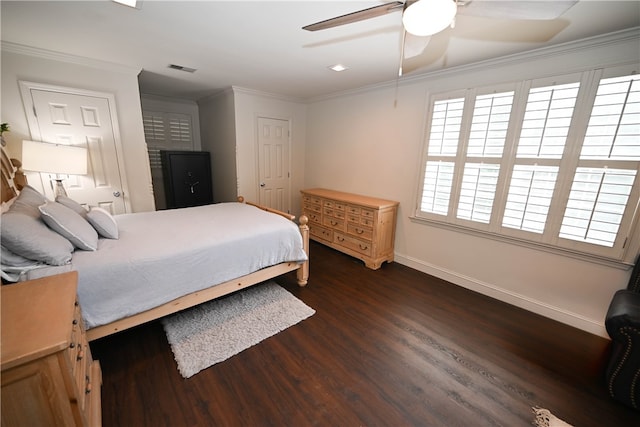 bedroom with ceiling fan, dark wood-type flooring, and ornamental molding