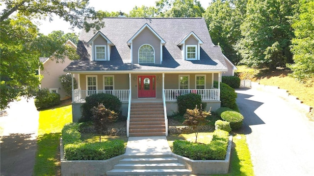 cape cod home with covered porch