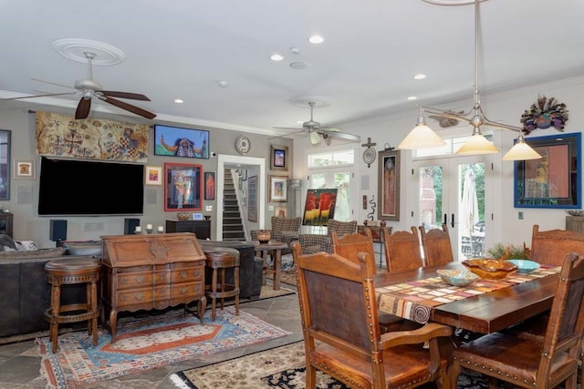 dining space featuring french doors, ceiling fan, and ornamental molding