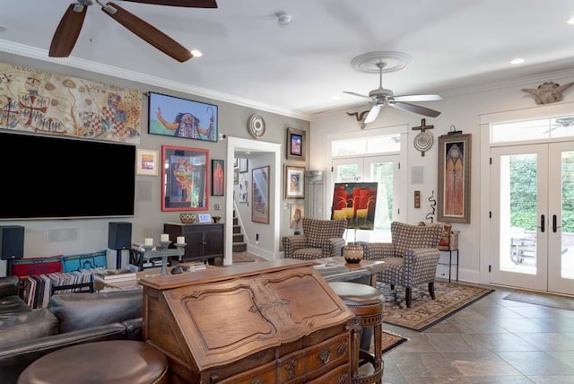 living room with french doors, ceiling fan, and crown molding