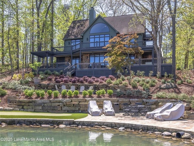 522 Ridgeway Dr, Eclectic, AL 36024 - back of property with a chimney